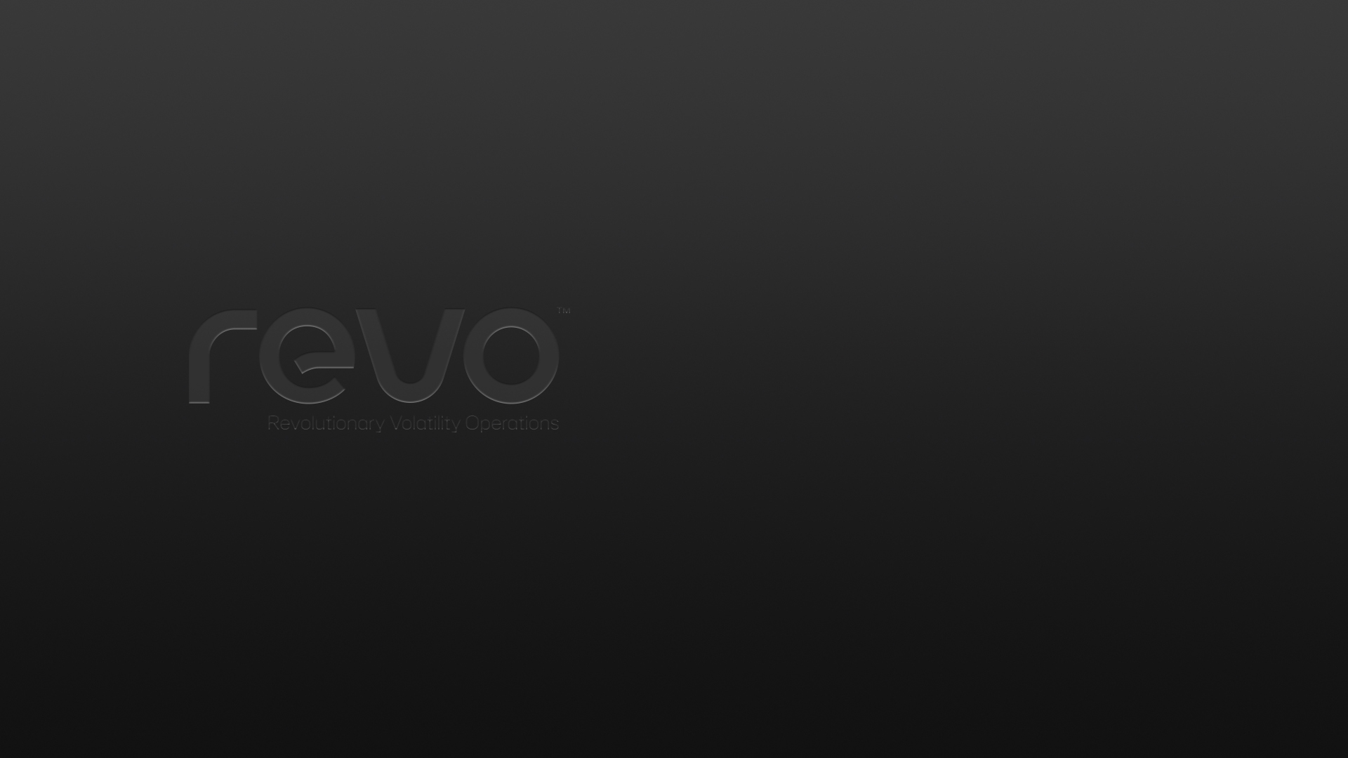 An embossed REVO wordmark on a charcoal surface, from the original brand collection